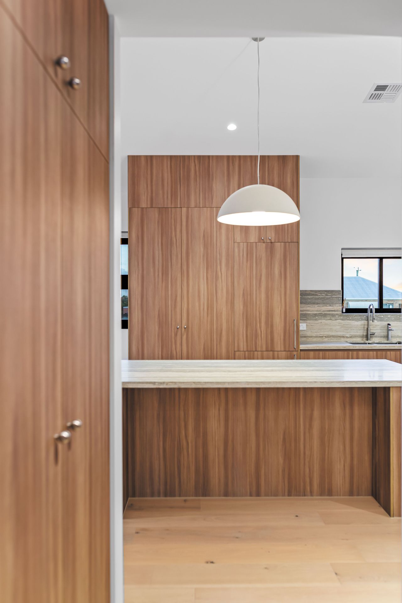 Kitchen - timber cabinetry and pendant light