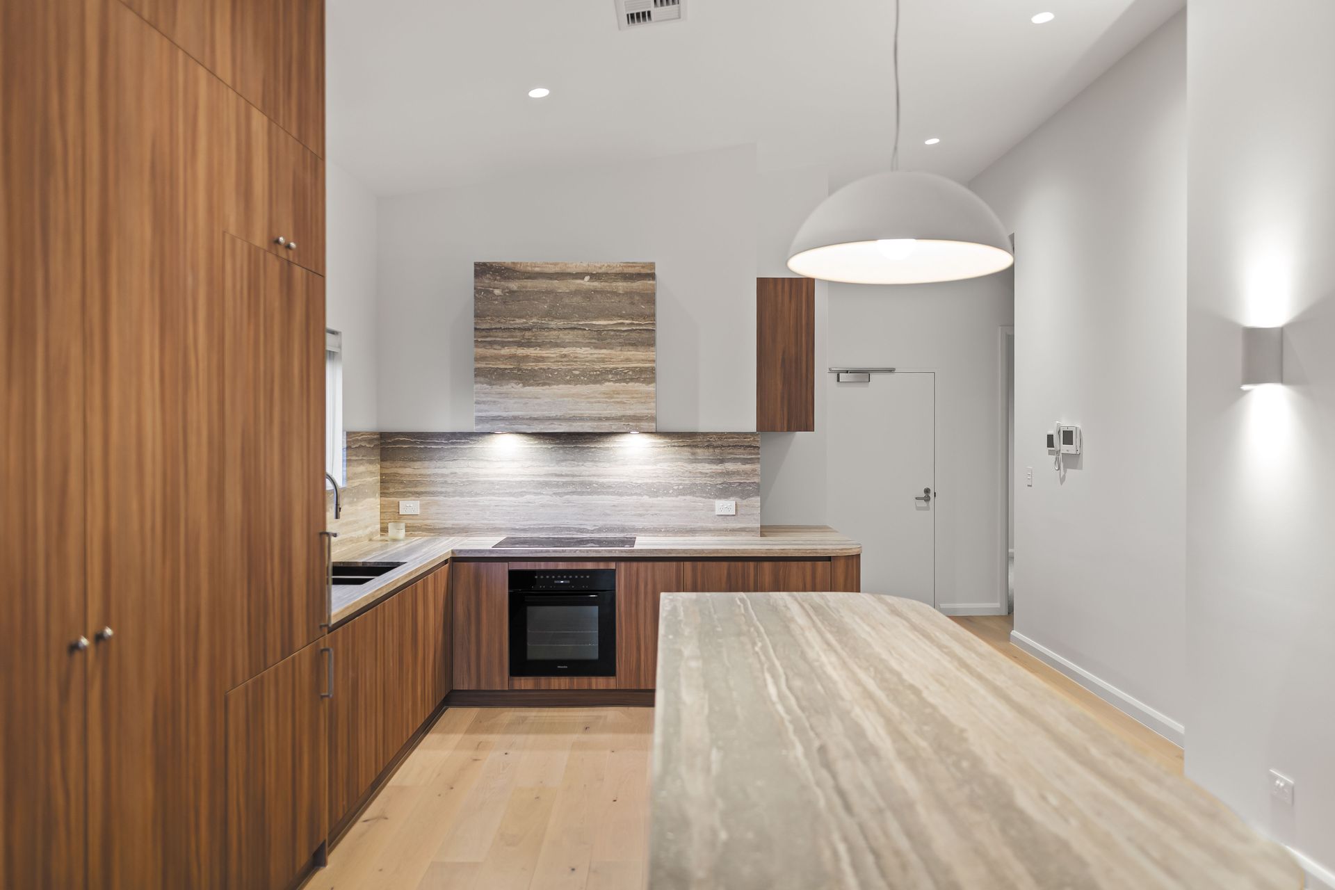 Kitchen - full view with stone island bench