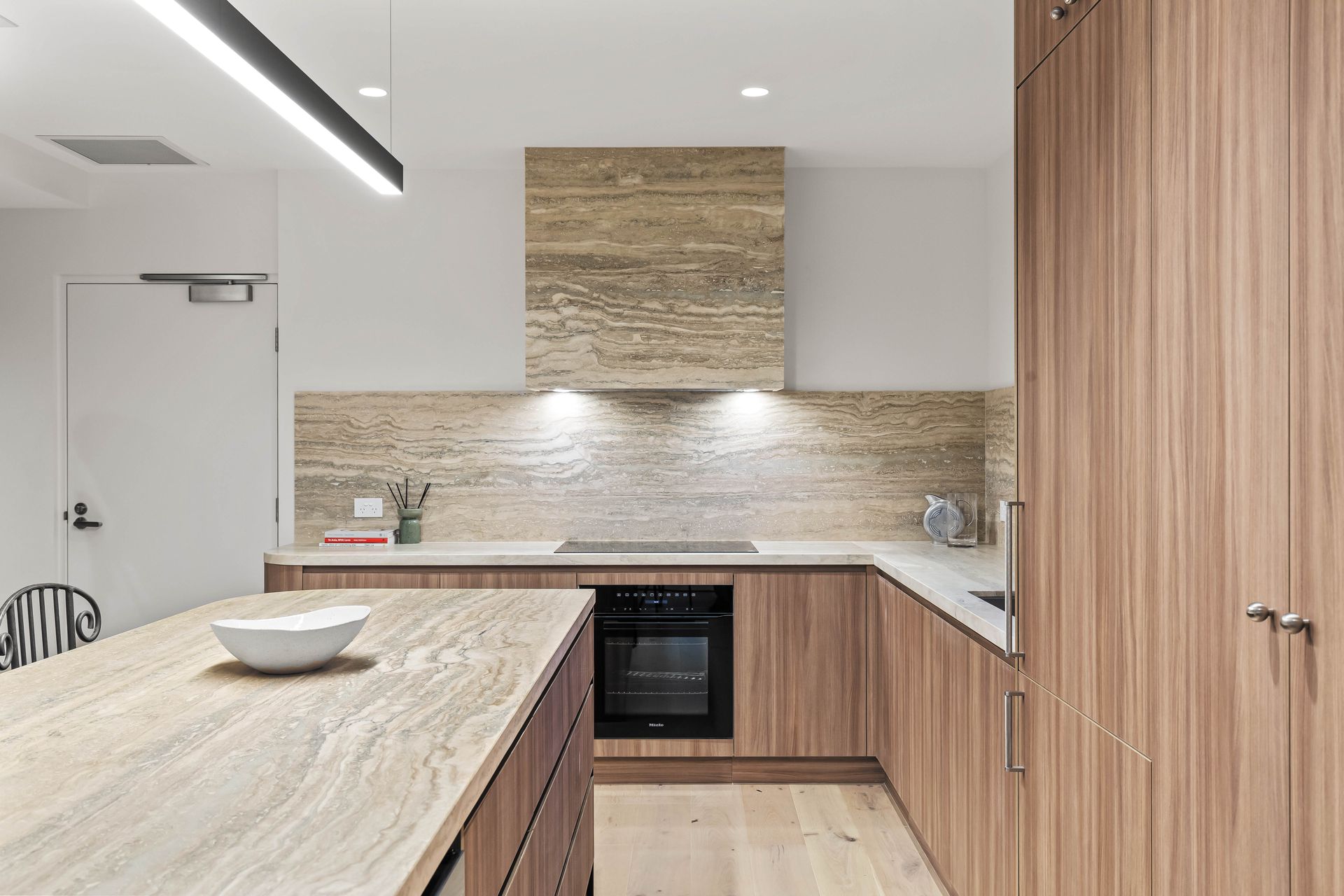 Kitchen detail - stone rangehood and Miele oven